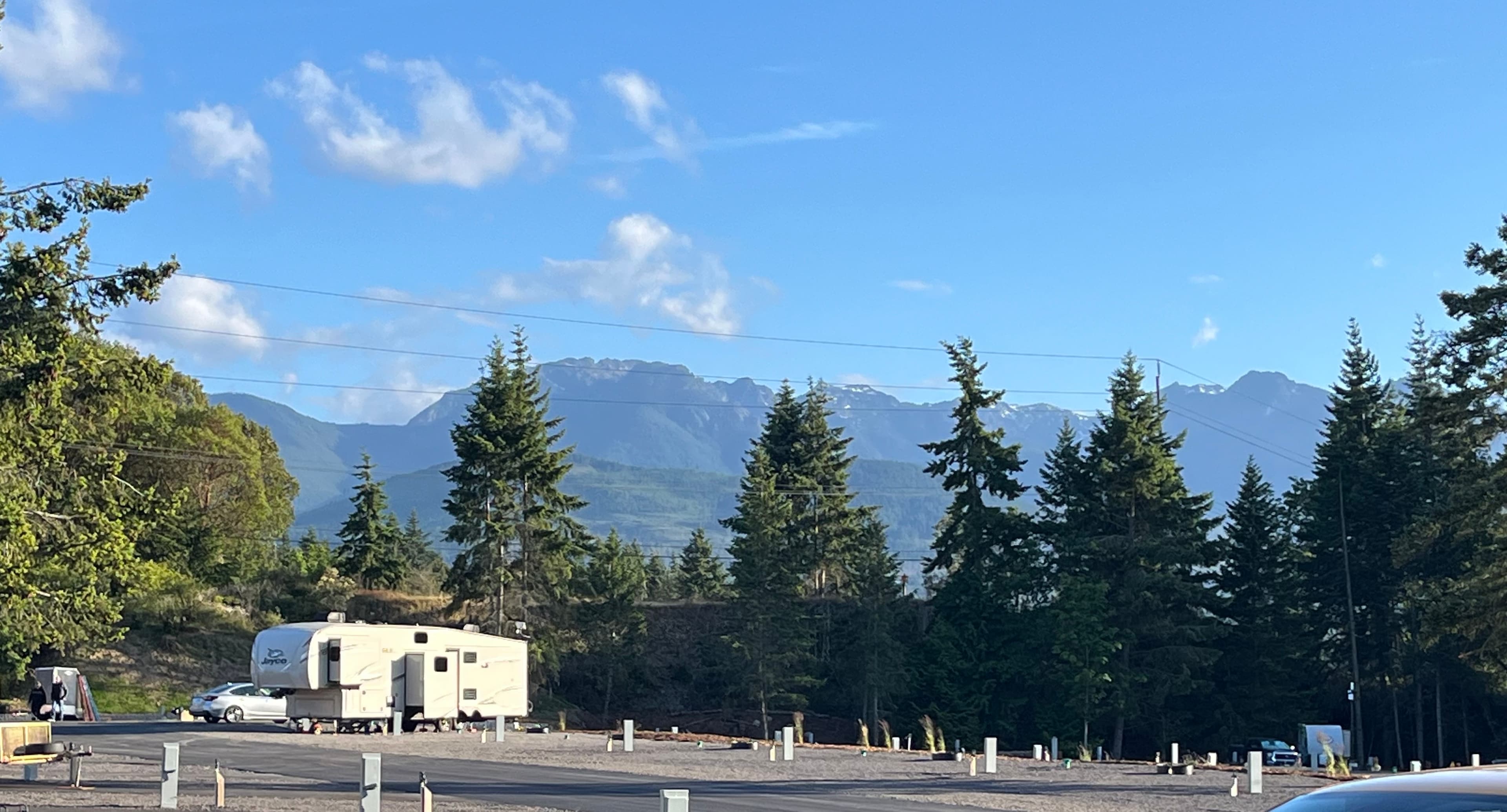 Sweeping mountain landscape with evergreen trees at an RV@ destination